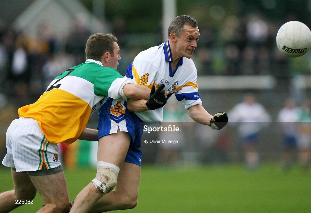 8 October 2006; Hugh Quinn, Errigal Ciaran, is tackled by Paul Daly, Carrickmore. WJ Dolan Tyrone Senior Football Championship Final Replay, Errigal Ciaran v Carrickmore, Healy Park, Omagh, Co Tyrone. Picture credit: Oliver McVeigh / SPORTSFILE