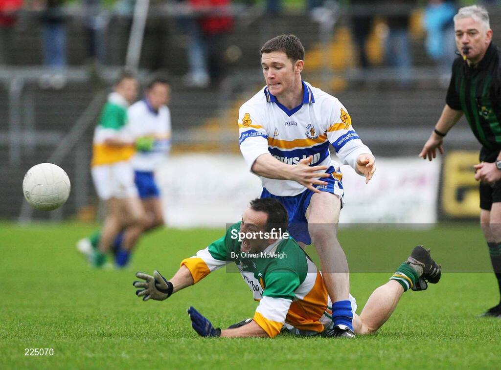 8 October 2006; Ronan McGarrity, Carrickmore, in action against Enda McGinley, Errigal Ciaran. WJ Dolan Tyrone Senior Football Championship Final Replay, Errigal Ciaran v Carrickmore, Healy Park, Omagh, Co Tyrone. Picture credit: Oliver McVeigh / SPORTSFILE
