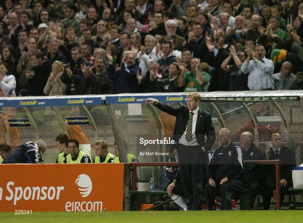 11 October 2006; Irish soccer fans cheer on the team as manager Stephen Staunton watches the game against the Czech Republic. Euro 2008 Championship Qualifier, Republic of Ireland v Czech Republic, Lansdowne Road, Dublin. Picture credit: Matt Browne / SPORTSFILE