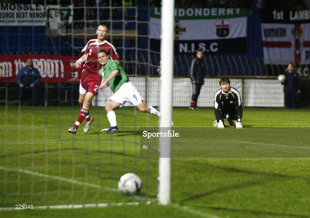 11 October 2006; David Healy, Northern Ireland, turns to celebrate as he scores while Latvia goalkeeper Alexandras Kolinka and Dzintars Zirnis look on.  Euro 2008 Championship Qualifier, Northern Ireland v Latvia, Windsor Park, Belfast. Picture credit: Russell Pritchard / SPORTSFILE