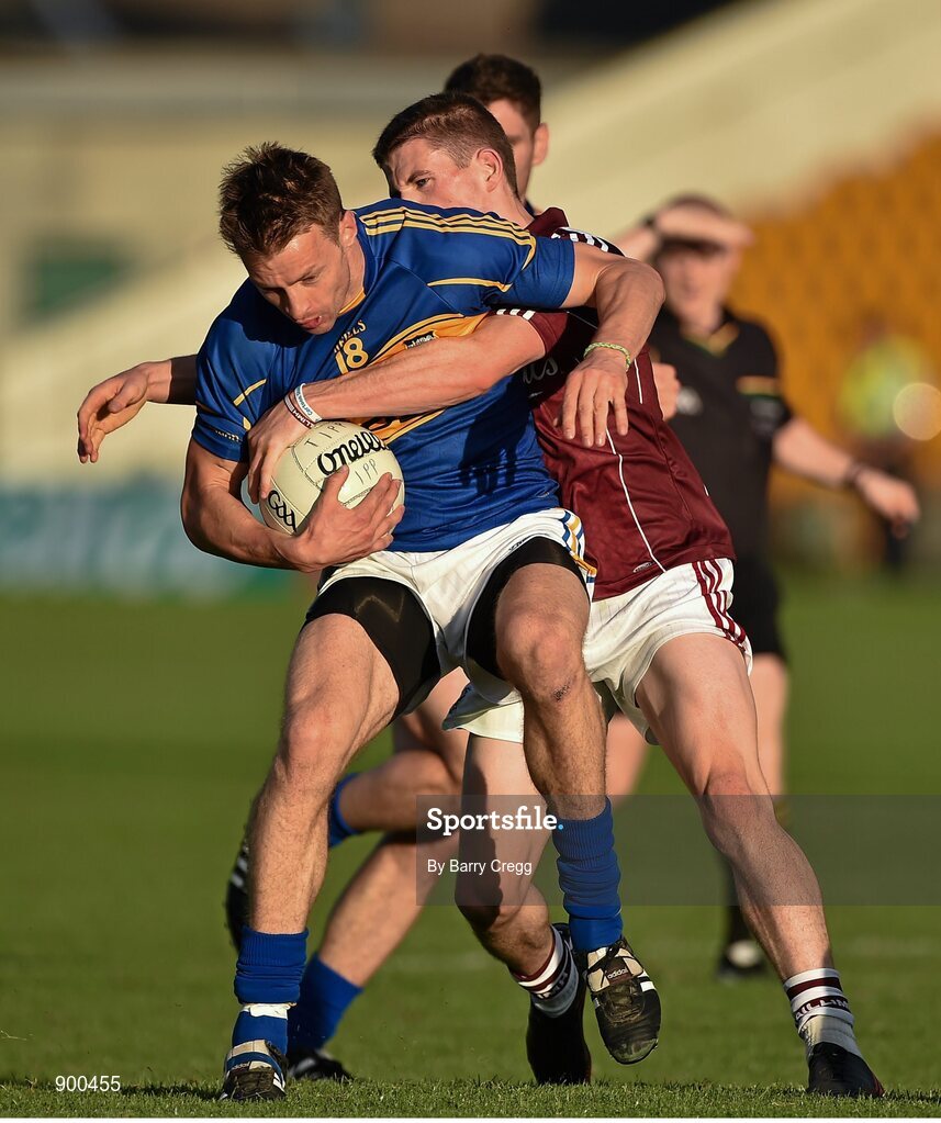 26 July 2014;  Hugh Coughlan, Tipperary, in action against Paul Varley, Galway. GAA Football All Ireland Senior Championship, Round 4A, Galway v Tipperary. O'Connor Park, Tullamore, Co. Offaly. Picture credit: Barry Cregg / SPORTSFILE