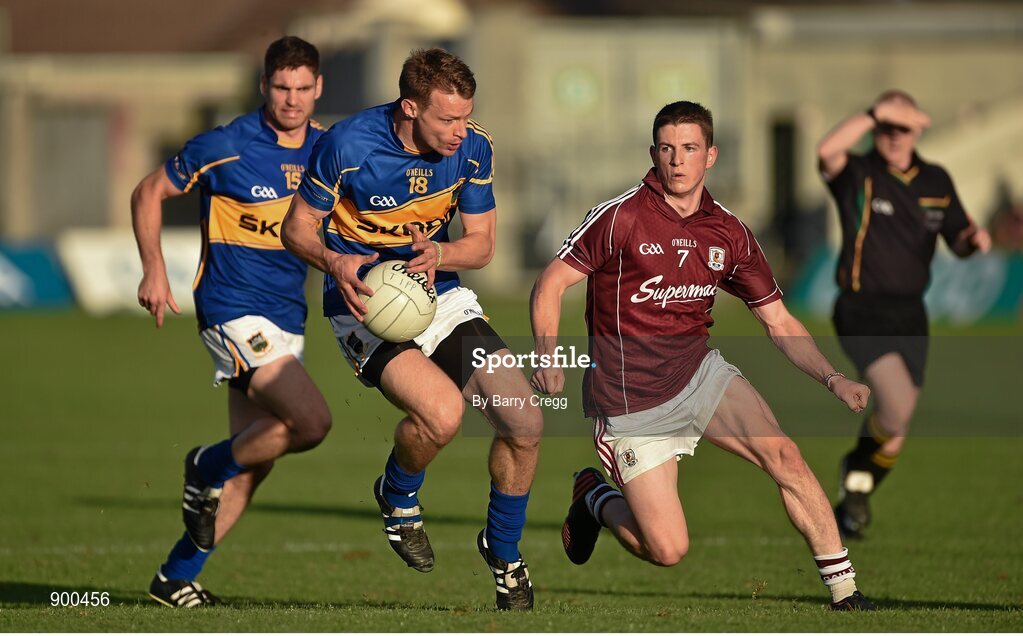 26 July 2014;  Hugh Coughlan, Tipperary, with support from Philip Austin, in action against Paul Varley, Galway. GAA Football All Ireland Senior Championship, Round 4A, Galway v Tipperary. O'Connor Park, Tullamore, Co. Offaly. Picture credit: Barry Cregg / SPORTSFILE