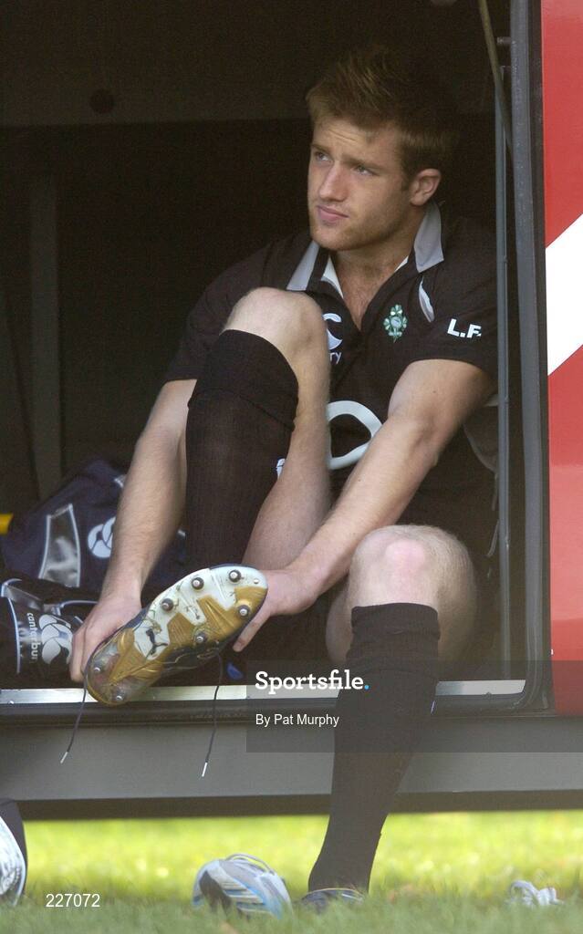 31 October 2006; Luke Fitzgerald puts on his boots before Ireland rugby squad training. St. Gerard's School, Bray, Co. Wicklow. Picture credit: Pat Murphy / SPORTSFILE