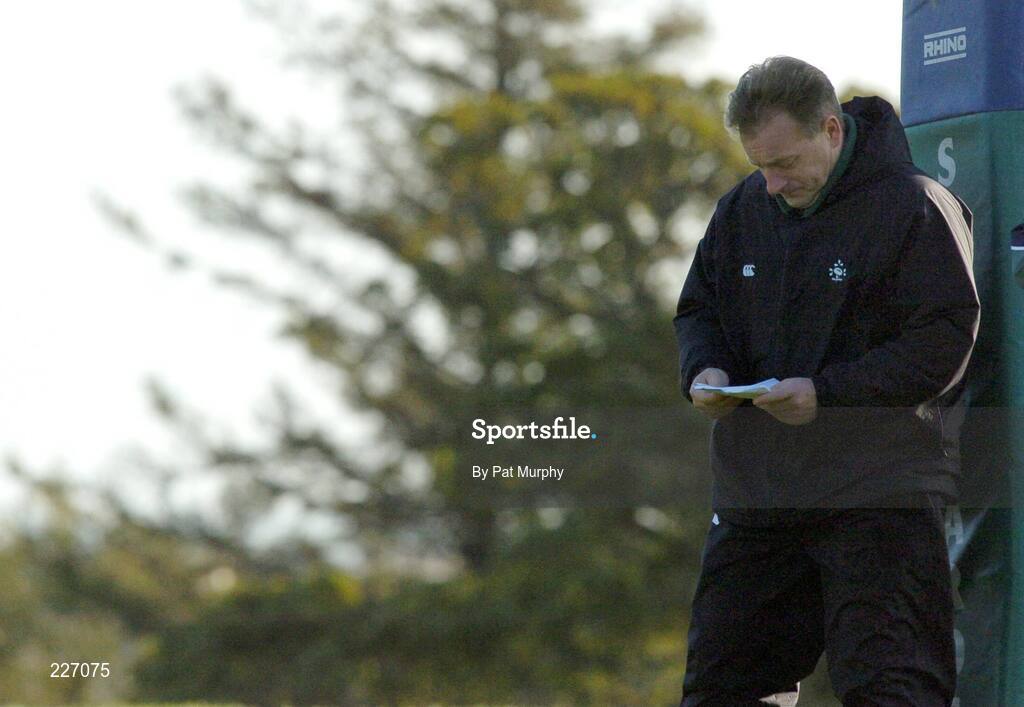 31 October 2006; Head Coach Eddie O'Sullivan checks his notes during Ireland rugby squad training. St. Gerard's School, Bray, Co. Wicklow. Picture credit: Pat Murphy / SPORTSFILE