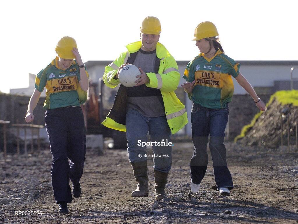 31 October 2006; Radek Podgorski, M & I Construction, gets some lessons from Leitrim Ladies footballers Sinead Quinn, left, and Amanda Sweeney, on the site of the proposed new stand in Pairc Sean MacDiarmada. An innovative fundraising drive, titled "Get On The Team", was launched today by Leitrim GAA supporters and Board to raise 1.5 million euro to complete the redevelopment of the stadium. Carrick-on-Shannon, Leirtim. Picture credit: Brian Lawless / SPORTSFILE