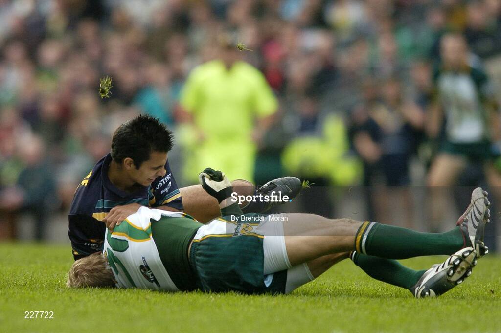 5 November 2006; Graham Geraghty, Ireland, is tackled by Danyle Pearse, Australia, before being stretchered off with an injury as a result of this tackle. Coca-Cola International Rules Series 2006, Second Test, Ireland v Australia, Croke Park, Dublin. Picture credit: Brendan Moran / SPORTSFILE