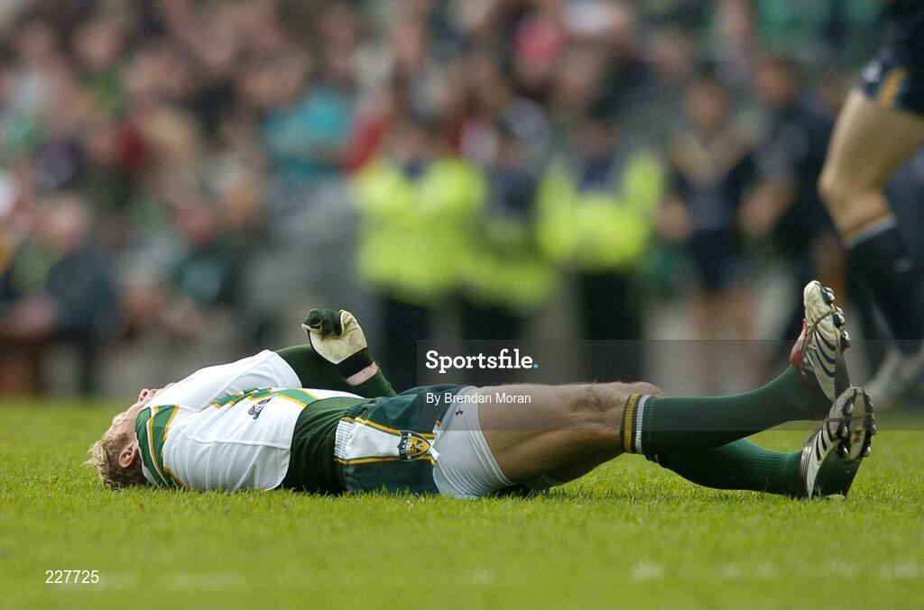 5 November 2006; Graham Geraghty, Ireland, lies injured after being tackled by Danyle Pearse, Australia, before being stretchered off with an injury as a result of the tackle. Coca-Cola International Rules Series 2006, Second Test, Ireland v Australia, Croke Park, Dublin. Picture credit: Brendan Moran / SPORTSFILE