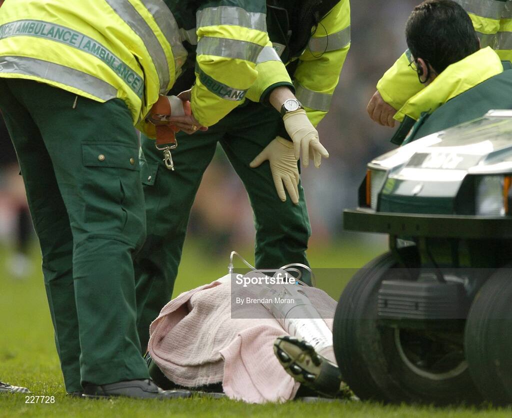 5 November 2006; Graham Geraghty, Ireland, is attended to by medical staff after injured after being tackled by Danyle Pearse, Australia, before being stretchered off with an injury as a result of the tackle. Coca-Cola International Rules Series 2006, Second Test, Ireland v Australia, Croke Park, Dublin. Picture credit: Brendan Moran / SPORTSFILE