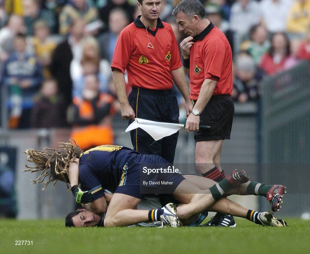 5 November 2006; Chance Bateman, Australia, confronts Paul Galvin, Ireland, before the start of the game as assistant referee Pat Enaney, right, looks on. Coca-Cola International Rules Series 2006, Second Test, Ireland v Australia, Croke Park, Dublin. Picture credit: David Maher / SPORTSFILE