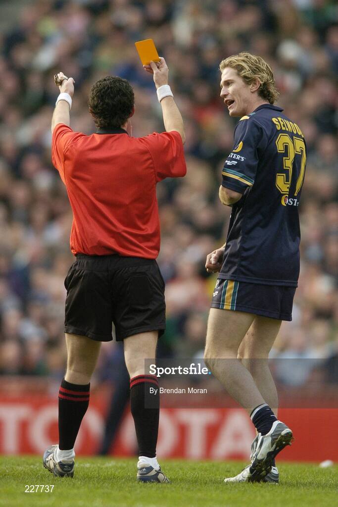 5 November 2006; Adam Selwood, Australia, is shown a yellow card by referee Shane McInerney. Coca-Cola International Rules Series 2006, Second Test, Ireland v Australia, Croke Park, Dublin. Picture credit: Brendan Moran / SPORTSFILE