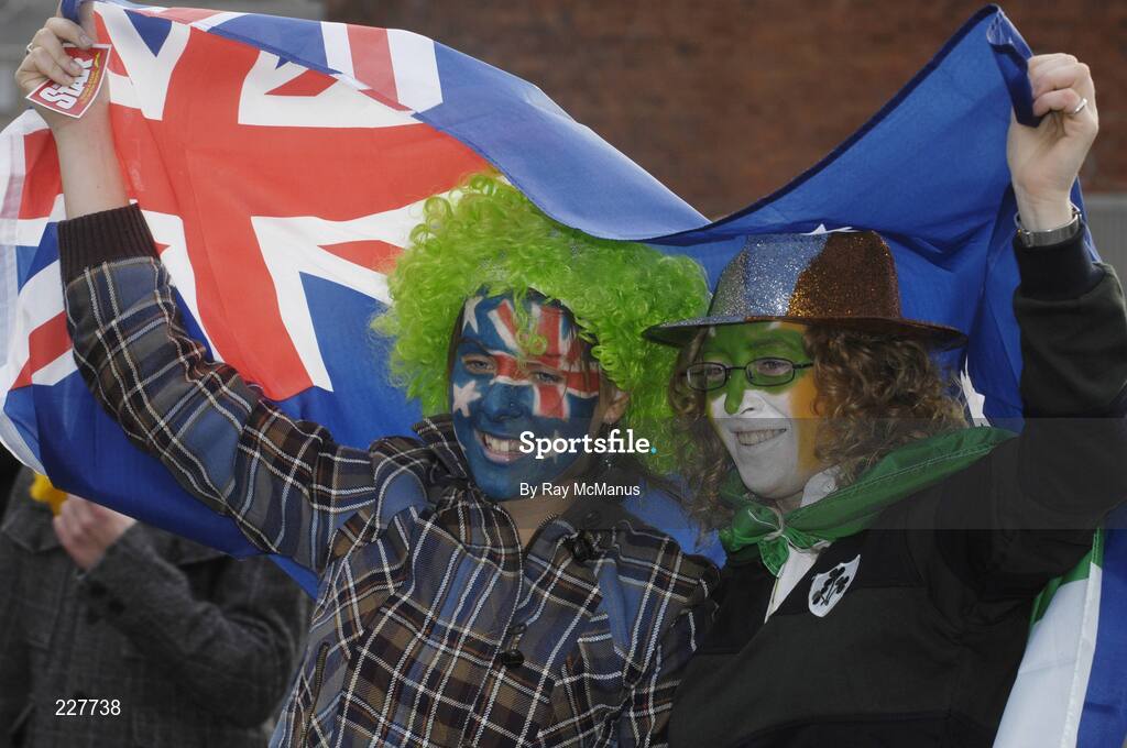 5 November 2006; Lana Roberts, left, Victoria, Australia, and Lorna Poole, Enniscorthy, Co. Wexford, Ireland, support a side each as they make their way to the game. Coca-Cola International Rules Series 2006, Second Test, Ireland v Australia, Croke Park, Dublin. Picture credit: Ray McManus / SPORTSFILE