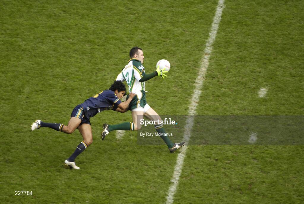 5 November 2006; Paul Barden, Ireland, is tackled by Aaron Davey, Australia. Coca-Cola International Rules Series 2006, Second Test, Ireland v Australia, Croke Park, Dublin. Picture credit: Ray McManus / SPORTSFILE