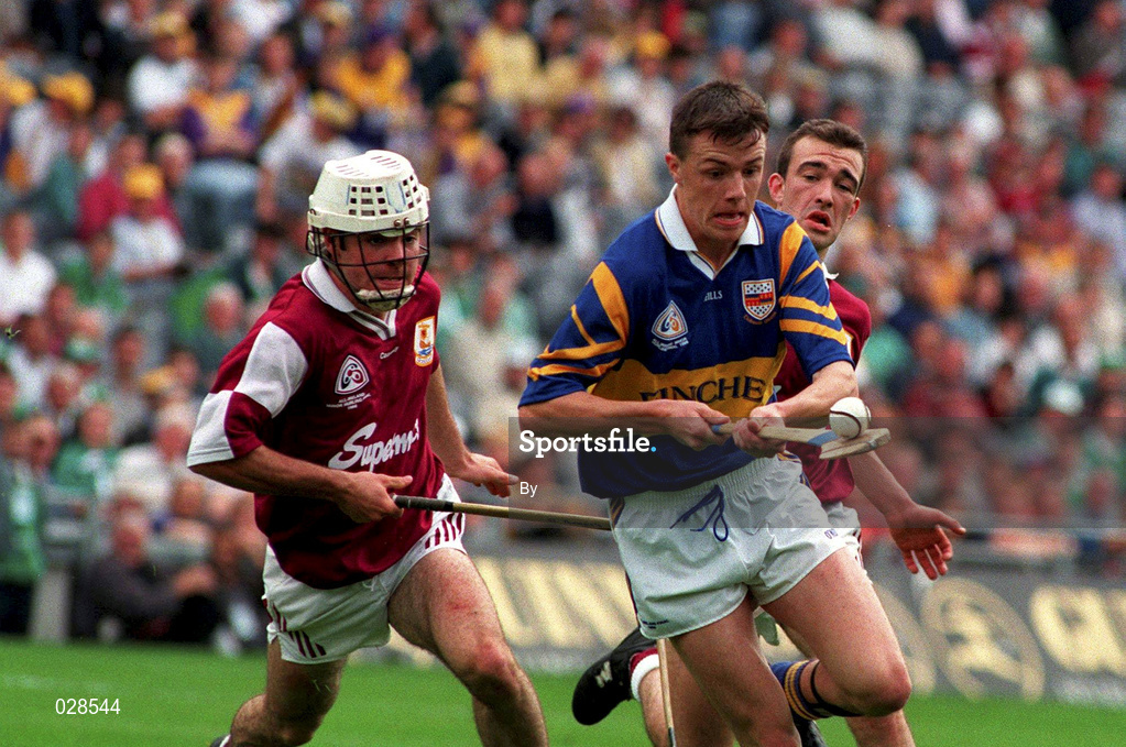 1 September 1996; Aidan Doyle, Tipperary, is tackled by Kevin Coy, Galway. All Ireland Minor Hurling. Picture credit; Ray McManus/SPORTSFILE