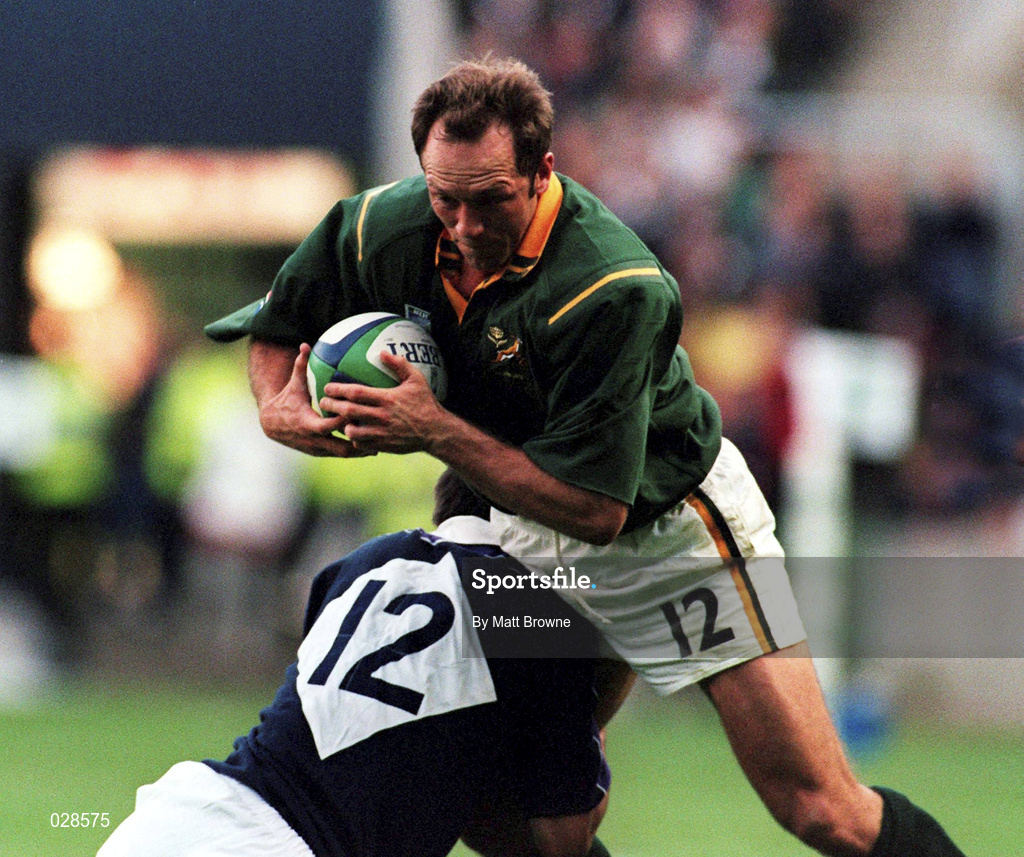3 October 1999; Brendan Venter of South Africa is tackled by John Leslie of Scotland during the Rugby World Cup Pool A match between Scotland and South Africa at Murrayfield Stadium in Edinburgh, Scotland. Photo by Matt Browne/Sportsfile