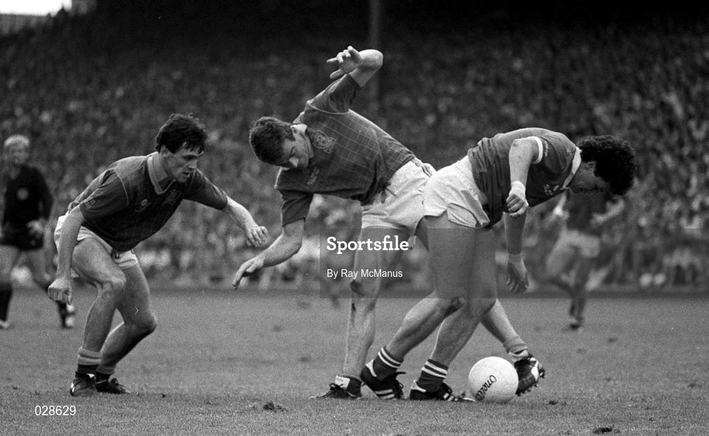 20 September 1987; David Beggy, left, and Colm O'Rourke of Meath in action against Denis Walsh of Cork during the All-Ireland Senior Football Championship Final match between Meath and Cork at Croke Park in Dublin. Photo by Ray McManus/Sportsfile