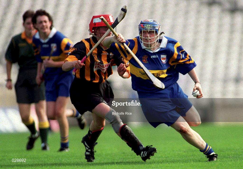 5 September 1999; Deirdre Hughes of Tipperary in action against Jillian Maher of Kilkenny during the Bórd na Gaeilge All-Ireland Senior Camogie Championship Final between Tipperary and Kilkenny at Croke Park in Dublin. Photo by Aoife Rice/Sportsfile