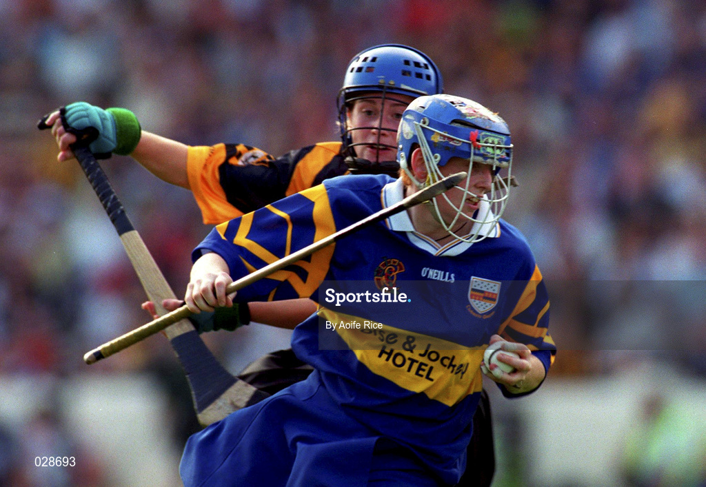 5 September 1999; Deirdre Hughes of Tipperary in action against Jillian Maher of Kilkenny during the Bórd na Gaeilge All-Ireland Senior Camogie Championship Final between Tipperary and Kilkenny at Croke Park in Dublin. Photo by Aoife Rice/Sportsfile