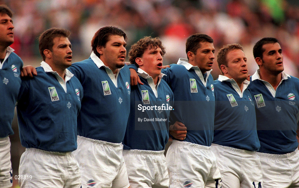 2 October 1999; Italy players stand for the national anthem during the Rugby World Cup Pool B match between England and Italy at Twickenham Stadium in London, England. Photo by David Maher/Sportsfile
