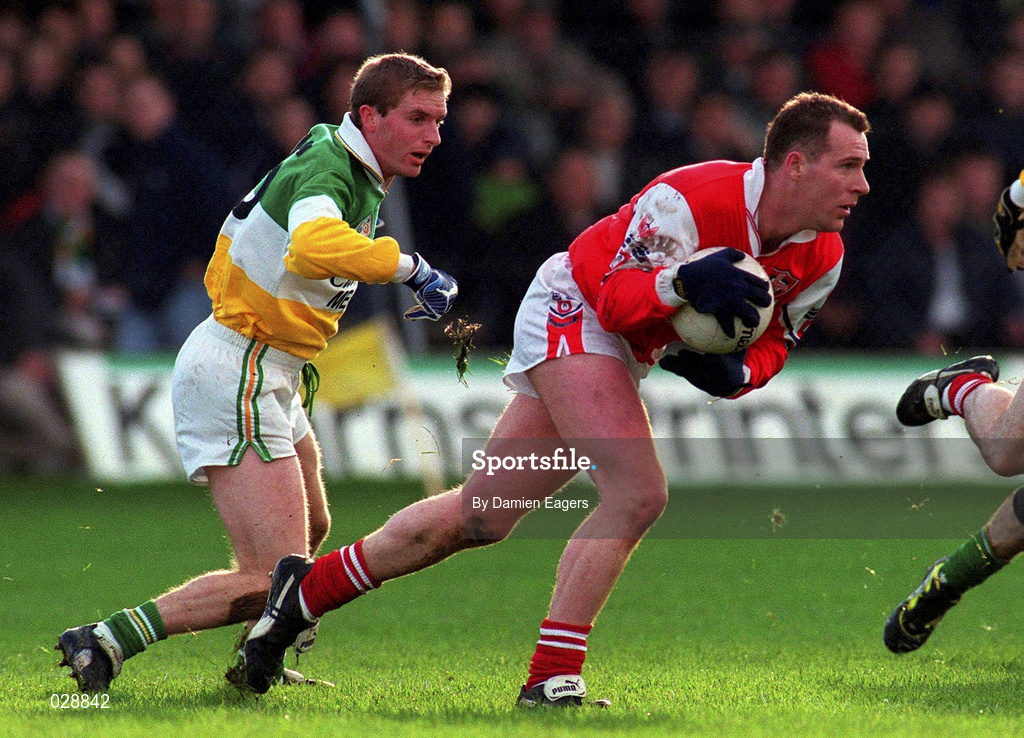 31 October 1999; Jim Holland of Louth in action against David Connolly of Offaly during the National Football League match between Offaly and Louth at O'Connor Park in Tullamore, Offaly. Photo by Damien Eagers/Sportsfile