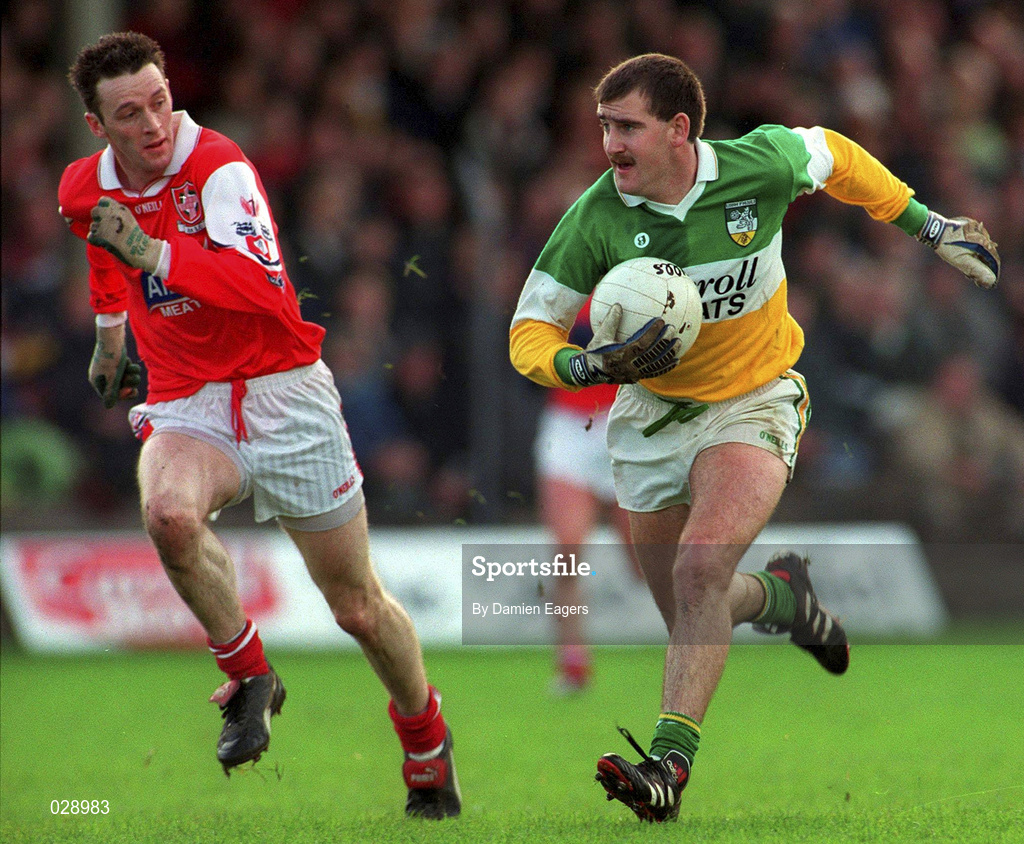 31 October 1999; Mel Keenaghan of Offaly in action against Brien Phillips of Louth during the National Football League match between Offaly and Louth at O'Connor Park in Tullamore, Offaly. Photo by Damien Eagers/Sportsfile