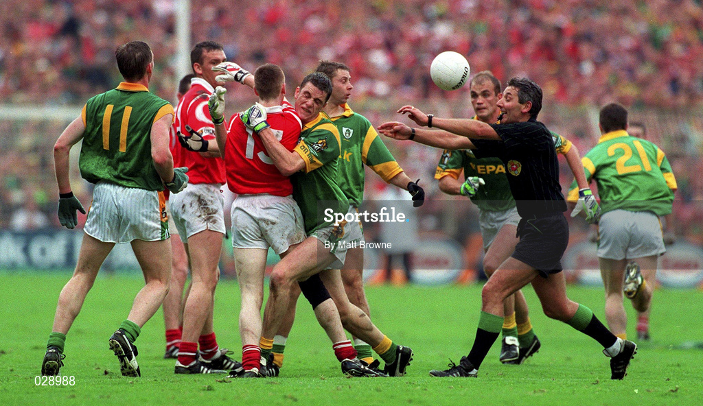 26 September 1999; Referee Michael Curley intervenes between Cork and Meath players during the GAA Football All-Ireland Senior Championship Final match between Meath and Cork at Croke Park in Dublin. Photo by Matt Browne/Sportsfile