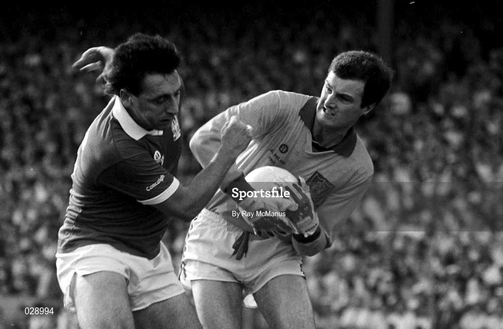 20 September 1987; Michael McQuillan of Meath in action against Jimmy Kerrigan of Cork during the All-Ireland Senior Football Championship Final match between Meath and Cork at Croke Park in Dublin. Photo by Ray McManus/Sportsfile