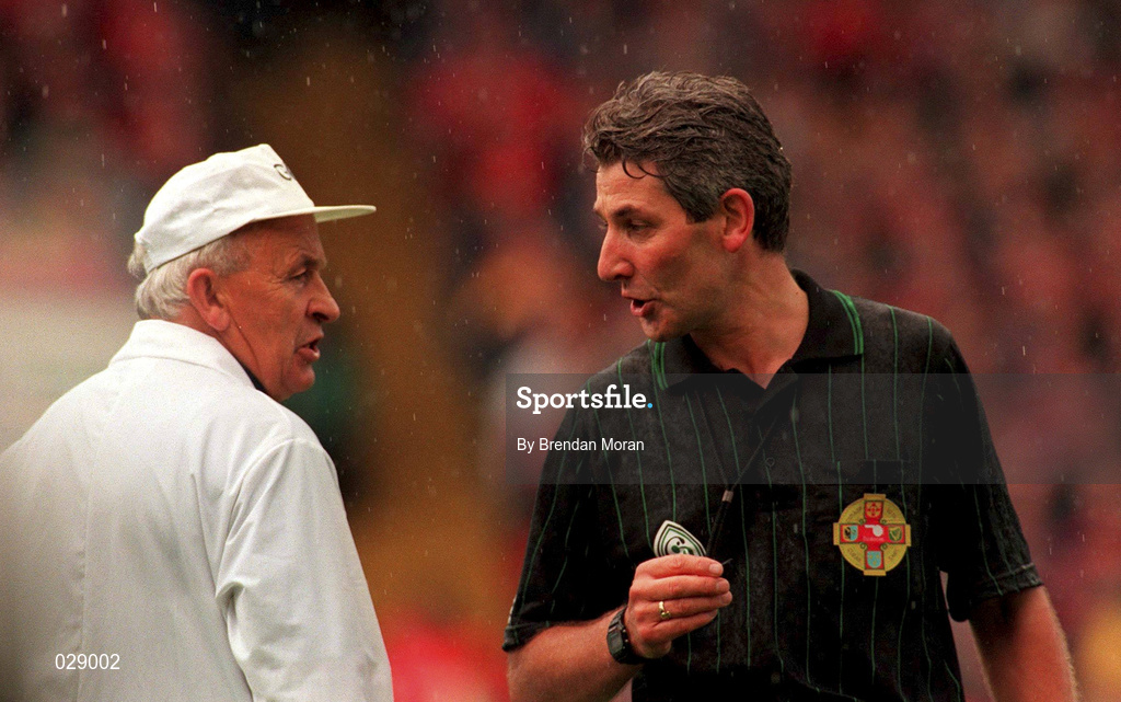 26 September 1999; Referee Mick Curley consults with an umpire during the GAA Football All-Ireland Senior Championship Final match between Meath and Cork at Croke Park in Dublin. Photo by Brendan Moran/Sportsfile