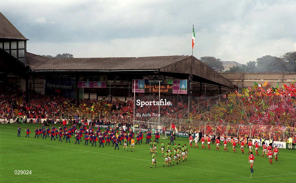 26 September 1999; Meath and Cork players follow the Artane Boys Band during the parade past The Nally Stand prior to the GAA Football All-Ireland Senior Championship Final match between Meath and Cork at Croke Park in Dublin. Photo by Aoife Rice/Sportsfile