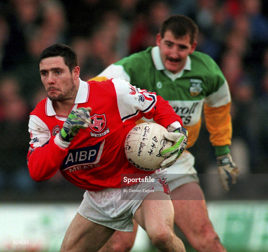 31 October 1999; Nicky Malone of Louth in action against Mel Keenaghan of Offaly during the National Football League match between Offaly and Louth at O'Connor Park in Tullamore, Offaly. Photo by Damien Eagers/Sportsfile