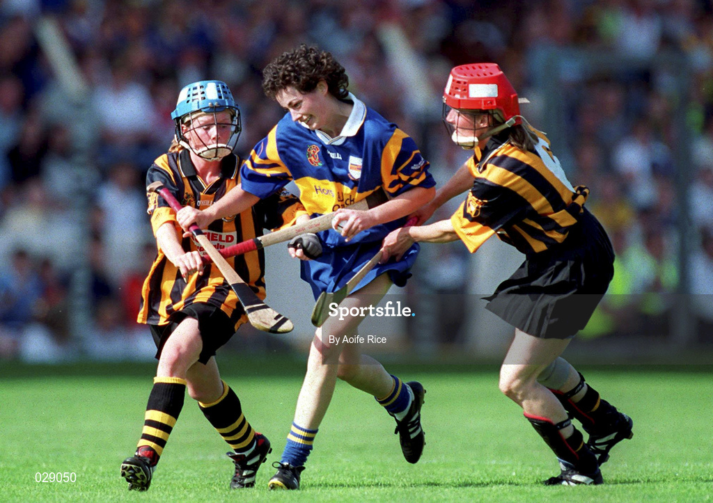 5 September 1999; Noelle Kennedy of Tipperary in action against Sandra Gleeson, left, Jillian Maher of Kilkenny during the Bórd na Gaeilge All-Ireland Senior Camogie Championship Final between Tipperary and Kilkenny at Croke Park in Dublin. Photo by Aoife Rice/Sportsfile