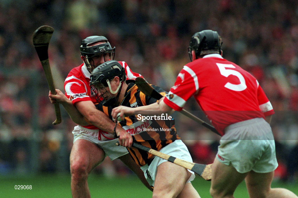 12 September 1999; P.J Delaney, Kilkenny in action against Brian Corcoran and Wayne Sherlock (5) Cork. Cork v Kilkenny, All-Ireland Hurling Final, Croke Park, Dublin. Picture credit; Brendan Moran/SPORTSFILE