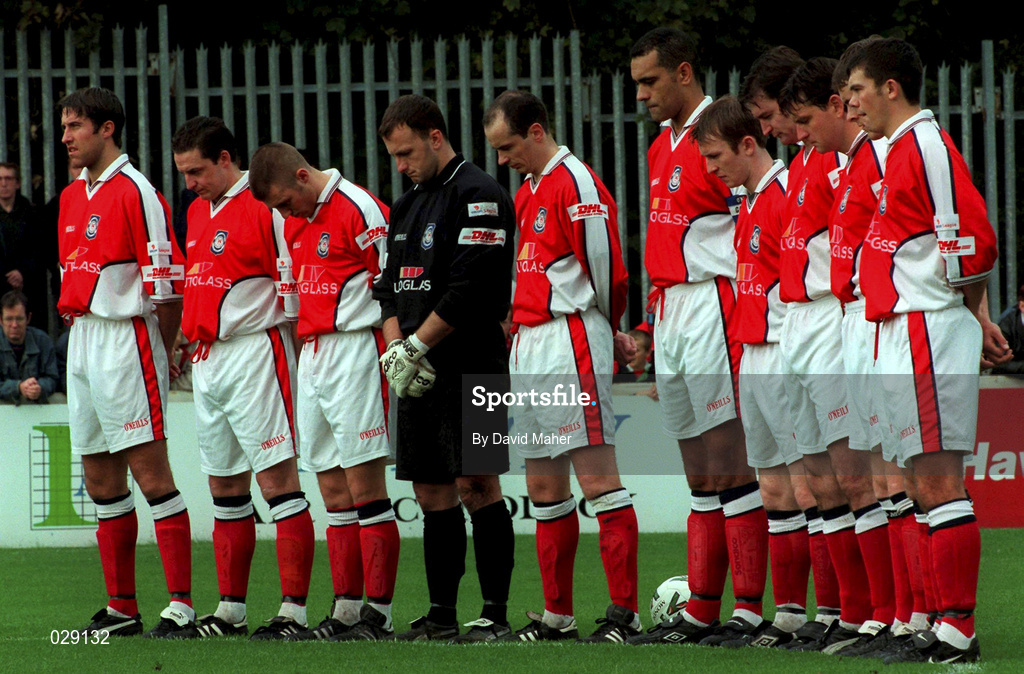 24 October 1999; St Patrick's Athletic players stand for a minute's silence in memory of the late Dr Tony O'Neill prior to the Eircom League Premier Division match between St Patrick's Athletic and Shamrock Rovers at Richmond Park in Dublin. Photo by David Maher/Sportsfile