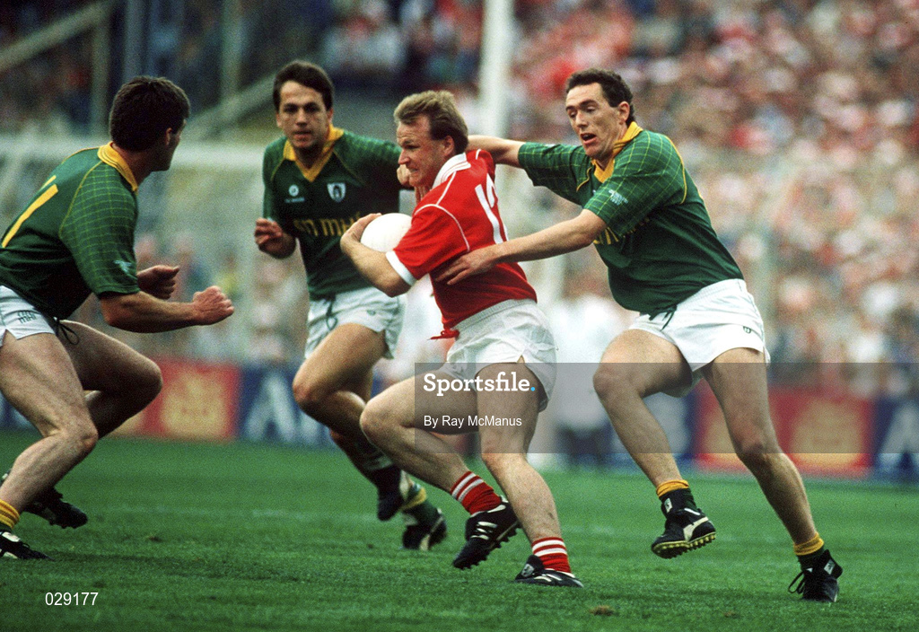 16 September 1990; Teddy McCarthy of Cork in action against Brian Stafford, right, and PJ Gillic of Meath during the All-Ireland Senior Football Championship Final match between Cork and Meath at Croke Park in Dublin. Photo by Ray McManus/Sportsfile