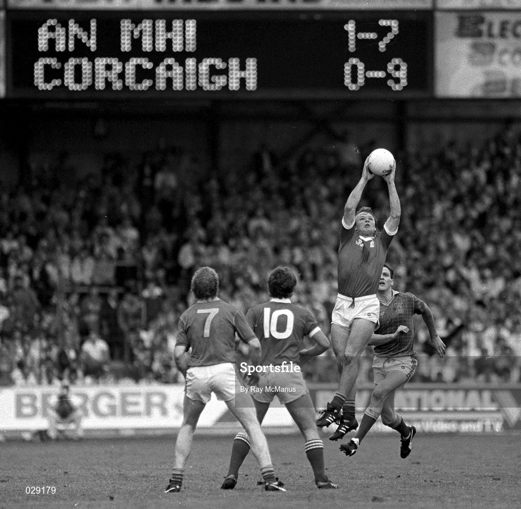 20 September 1987; Teddy McCarthy of Cork in action against Gerry McEntee of Meath watched by John O'Driscoll of Cork (10) and Martin OConnell of Meath (7) during the All-Ireland Senior Football Championship Final match between Meath and Cork at Croke Park in Dublin. Photo by Ray McManus/Sportsfile