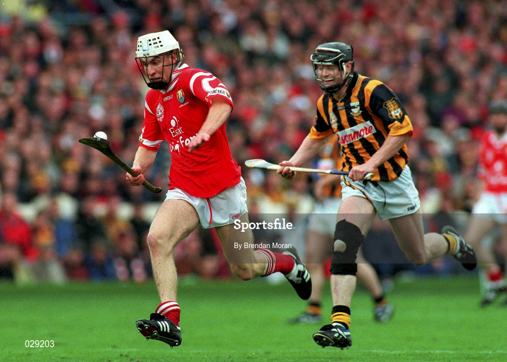 12 September 1999; Cork's Timmy McCarthy races clear of Kilkenny's Peter Barry. Cork v Kilkenny, All-Ireland Hurling Final, Croke Park, Dublin. Picture credit; Brendan Moran/SPORTSFILE