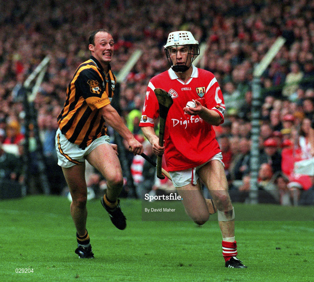 12 September 1999; Cork's Timmy McCarthy races clear of Kilkenny's Andy Comerford. Cork v Kilkenny, All-Ireland Hurling Final, Croke Park, Dublin. Picture credit; David Maher/SPORTSFILE