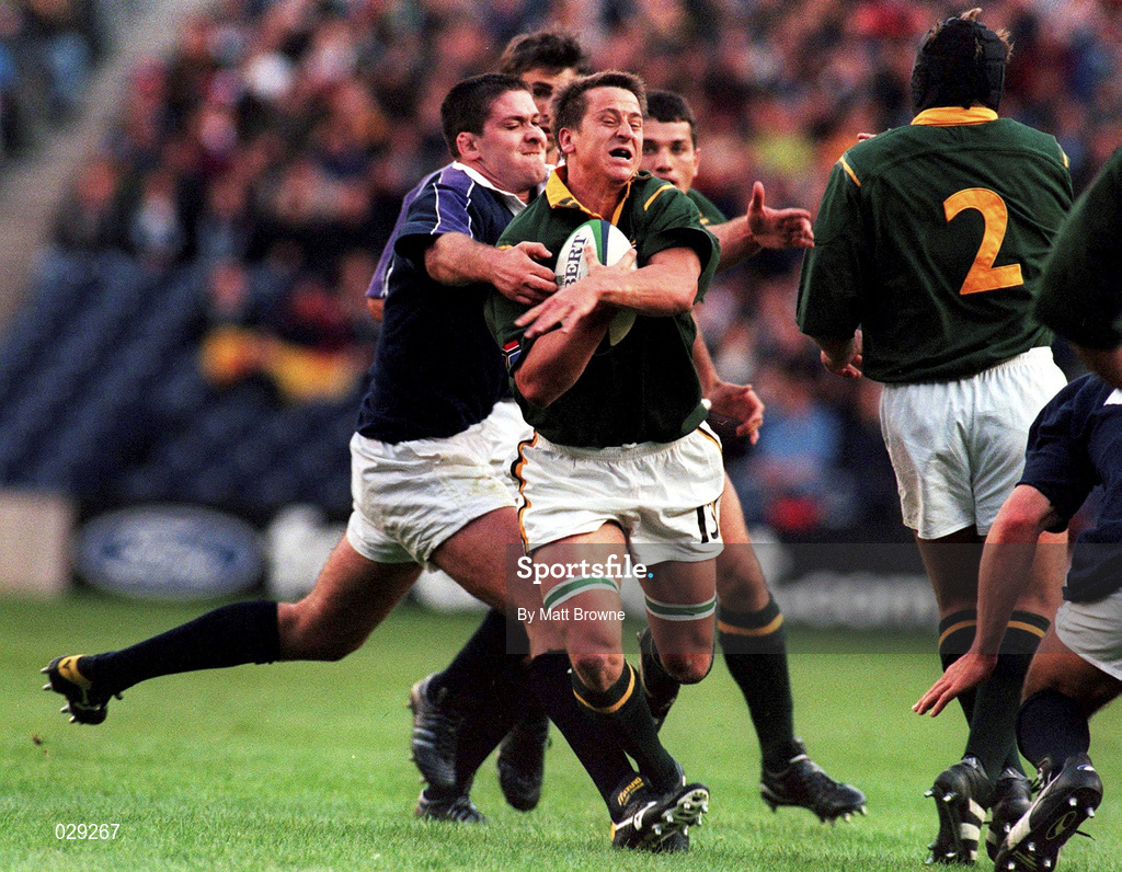 3 October 1999; Robbie Fleck of South Africa is tackled by Scott Murray of Scotland during the Rugby World Cup Pool A match between Scotland and South Africa at Murrayfield Stadium in Edinburgh, Scotland. Photo by Matt Browne/Sportsfile