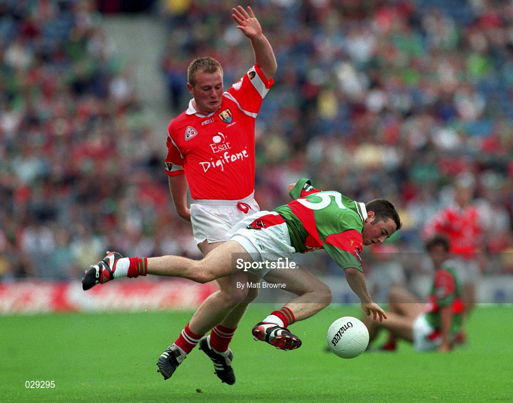 22 August 1999; Rory Keane of Mayo in action against Barry Loftus of Cork during the All-Ireland Senior Football Championship Semi-Final match between Cork and Mayo at Croke Park, Dublin. Photo by Matt Browne/Sportsfile