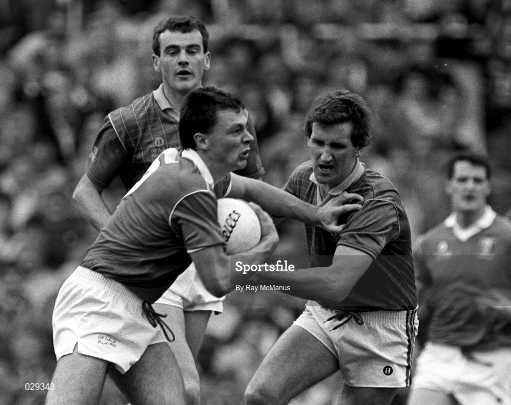 18 September 1988; Tony Davis of Cork in action against Mattie McCabe of Meath during the All-Ireland Senior Football Championship Final between Meath and Cork at Croke Park in Dublin. Photo by Ray McManus/Sportsfile