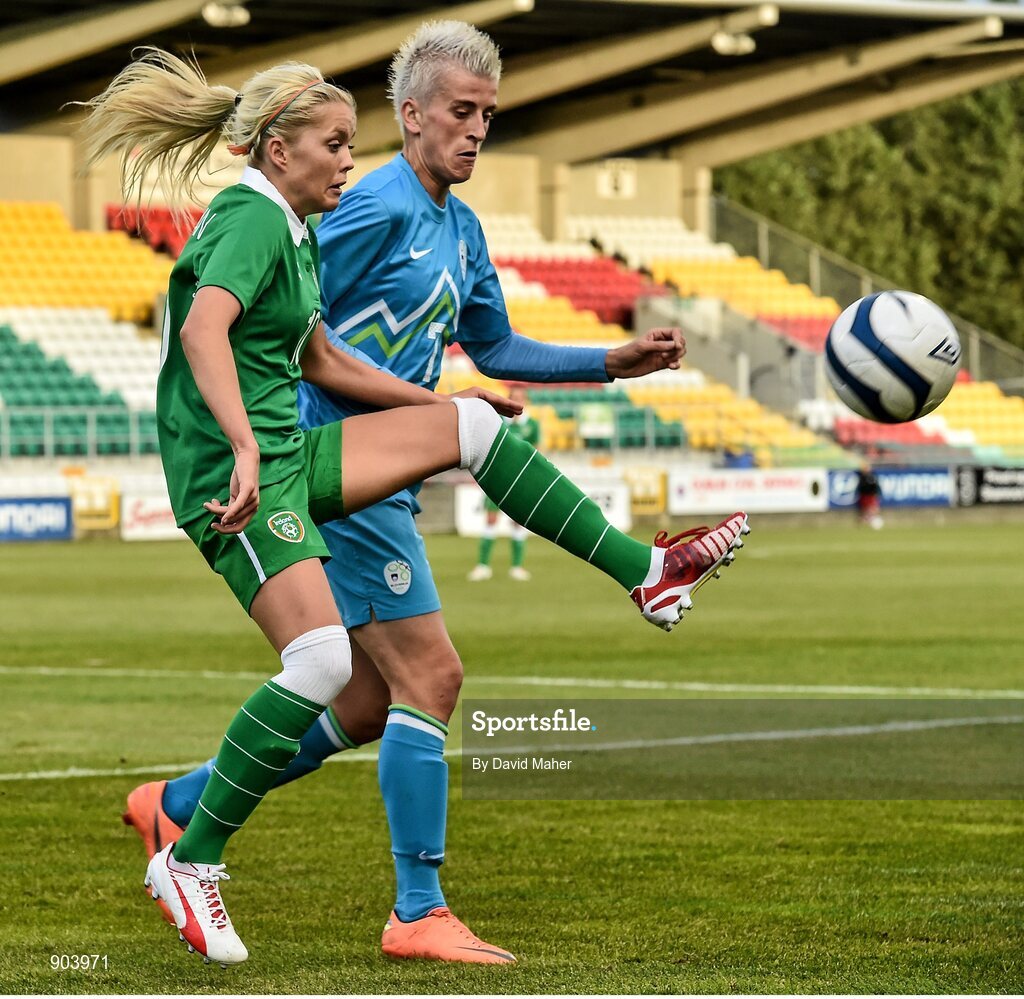20 August 2014; Denise O'Sullivan, Republic of Ireland, in action against Andreja Nikl, Slovenia. FIFA Women's World Cup Qualifier, Group 1, Republic of Ireland v Slovenia. Tallaght Stadium, Tallaght, Co. Dublin. Picture credit: David Maher / SPORTSFILE