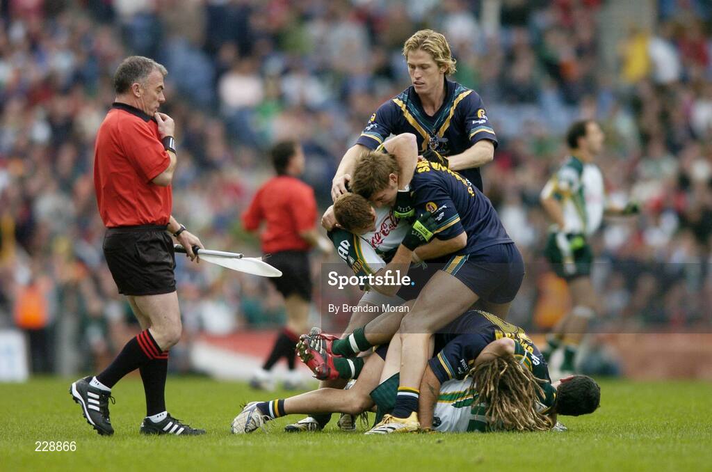 5 November 2006; Umpire Pat McEneaney attempts to get the referee's attention as Paul Galvin and Brendan Coulter, Ireland, and Chance Bateman and Justin Sherman get involved in a row, Australia. Coca-Cola International Rules Series 2006, Second Test, Ireland v Australia, Croke Park, Dublin. Picture credit: Brendan Moran / SPORTSFILE