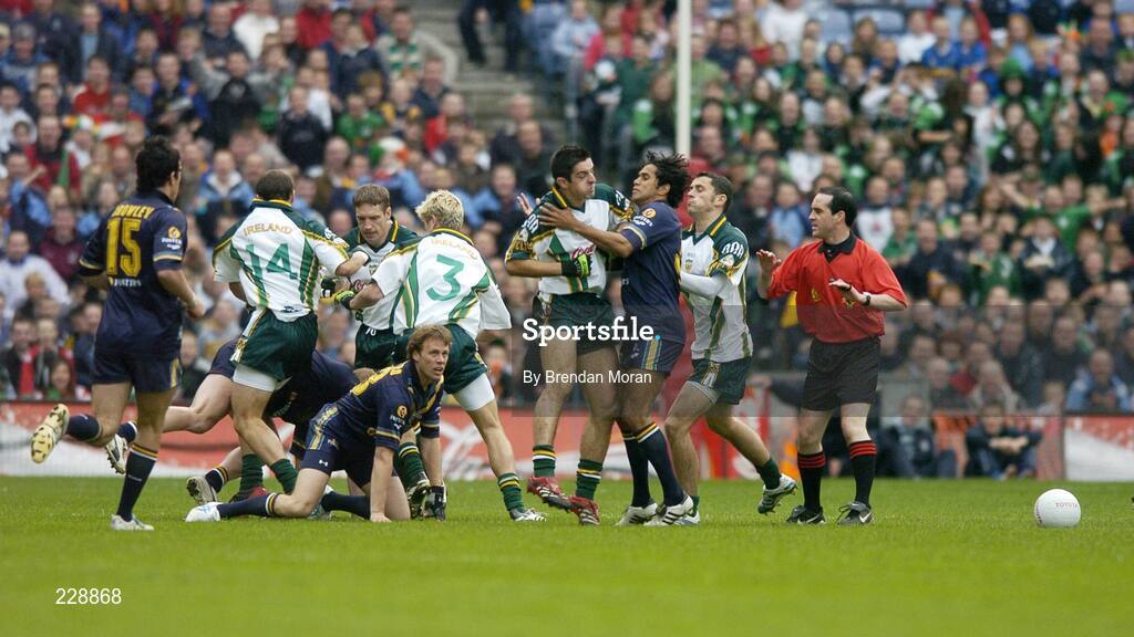 5 November 2006; Referee David Coldrick attempts to stop brawling by the Ireland and Australian players during the first quarter. Coca-Cola International Rules Series 2006, Second Test, Ireland v Australia, Croke Park, Dublin. Picture credit: Brendan Moran / SPORTSFILE