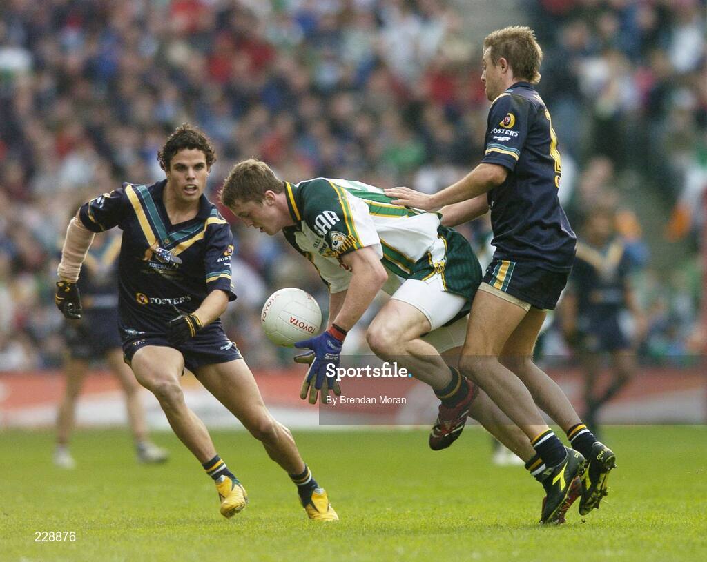 5 November 2006; Kevin Reilly, Ireland, in action against Matthew Lappin, right, and Brett Peake, Australia. Coca-Cola International Rules Series 2006, Second Test, Ireland v Australia, Croke Park, Dublin. Picture credit: Brendan Moran / SPORTSFILE