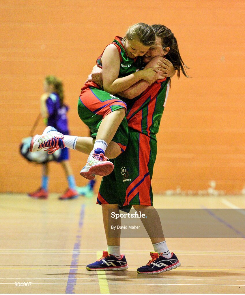 24 August 2014; Sarah Murtagh, left and Tara Gunning, Milltown/emper/Moyvore, Westmeath, representing Leinster, celebrate at the end of the game after defeating Donagh, Monaghan, representing Ulster, in the playoffl of the Basketball Girls Under 13. HSE Community Games August Festival 2014, Athlone Institute of Technology, Athlone, Co. Westmeath.  Picture credit: David Maher / SPORTSFILE