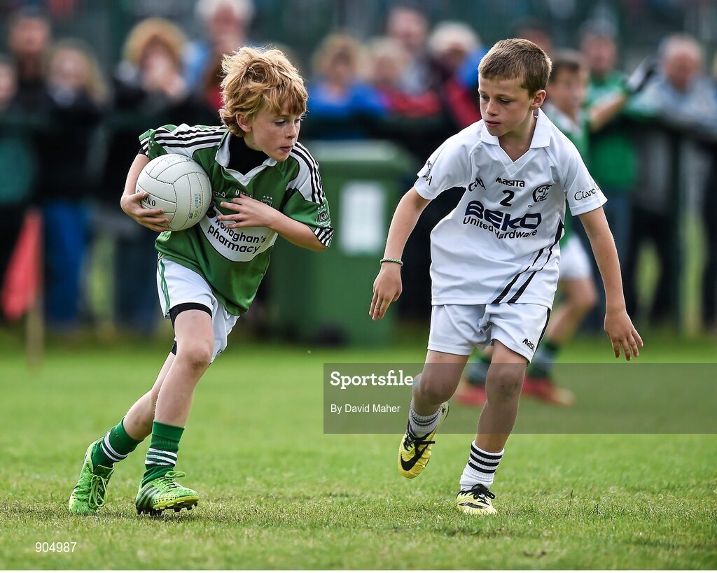 24 August 2014; Fionan Gallagher, Monaghan Town, Co.Monaghan, representing Ulster in the Gaellc football Mixed Under10 playoff final against James Donlan, Clane/Rathcoffey, Co.Kildare, representing Leinster. HSE Community Games August Festival 2014, Athlone Institute of Technology, Athlone, Co. Westmeath.  Picture credit: David Maher / SPORTSFILE