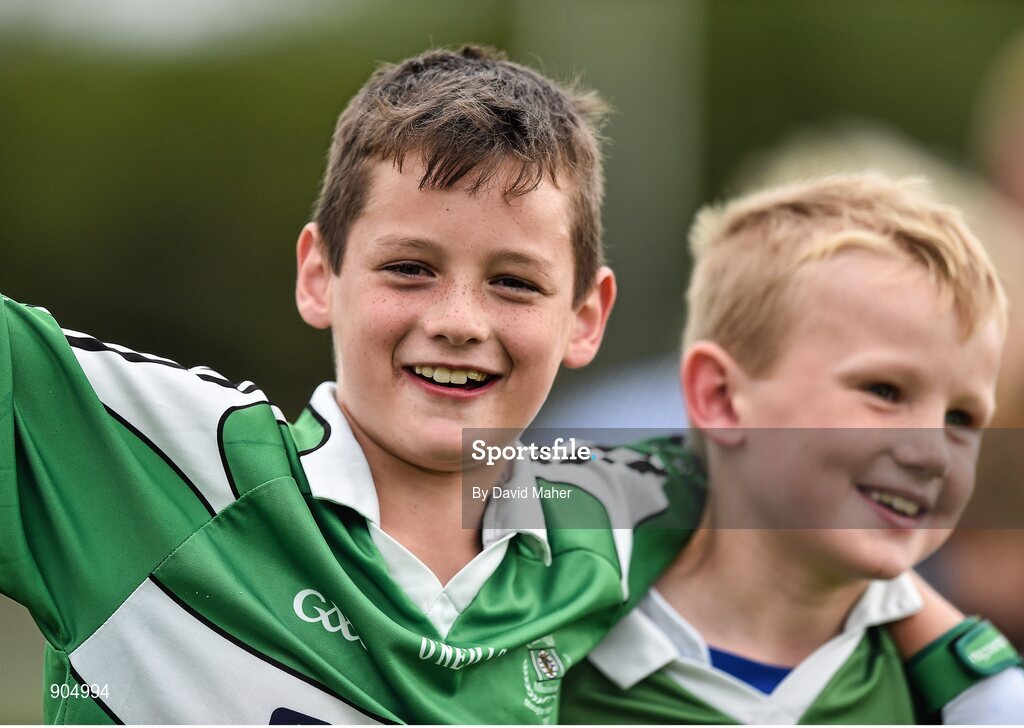 24 August 2014; Eoin O'Hanlon, left and Fionan Gallagher, Monaghan Town, Co.Monaghan, representing Ulster celebrate at the end of the Gaellc football Mixed Under 10 playoff final against Clane/Rathcoffey, Co.Kildare, representing Leinster. HSE Community Games August Festival 2014, Athlone Institute of Technology, Athlone, Co. Westmeath.  Picture credit: David Maher / SPORTSFILE
