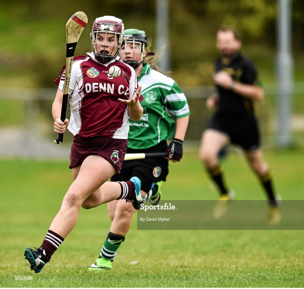 24 August 2014; Shanise Fitzsimmons, Ballyjamesduff, Co.Cavan, representing Ulster, in action against Siofra Byrne, Lucan, Co.Dublin, representing Leinster in the playoff of the Under 14 Camogie Final. HSE Community Games August Festival 2014, Athlone Institute of Technology, Athlone, Co. Westmeath.  Picture credit: David Maher / SPORTSFILE