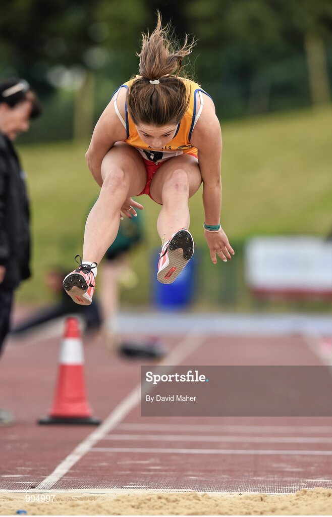 24 August 2014; Kate Taylor, Quin/Clooney, Co. Clare, in action during the Girls Under 16 Triple Jump. HSE Community Games August Festival 2014, Athlone Institute of Technology, Athlone, Co. Westmeath.  Picture credit: David Maher / SPORTSFILE