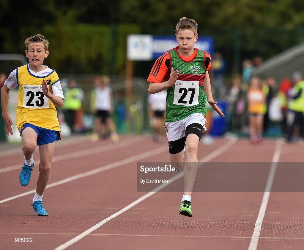 24 August 2014; Dylan Thornton, Quay, Co.Mayo, right, and David McDonnell, Strokestown, Co.Roscommon, in action during the semi Final of the Boys U.12 100metres . HSE Community Games August Festival 2014, Athlone Institute of Technology, Athlone, Co. Westmeath.  Picture credit: David Maher / SPORTSFILE
