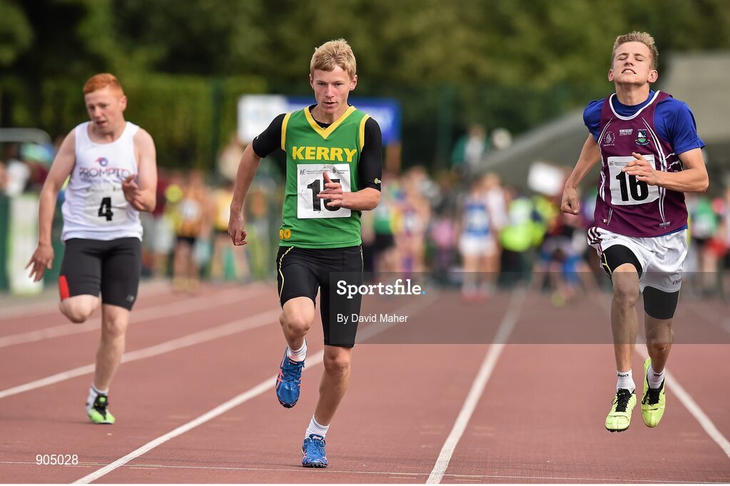 24 August 2014; James Harrington, Kenmare, Co.Kerry, centre, with Darragh Buckley, Mallow South, Co.Cork, left, and Shane Coyle, Moylough/Mountbellew, Co.Galway, in action during the semi Final of the Boys U.14 100 metres. HSE Community Games August Festival 2014, Athlone Institute of Technology, Athlone, Co. Westmeath.  Picture credit: David Maher / SPORTSFILE